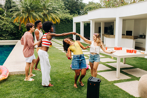 Limbo game at pool party