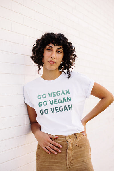 Female vegan activist wearing a GO VEGAN shirt