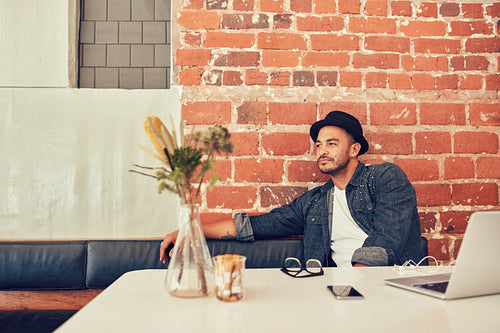Man waiting for someone at cafe
