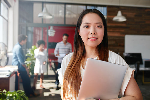 Young creative professional in office