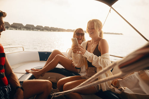 Family enjoying a boat vacation, capturing moments and laughter on a beautiful day on the water