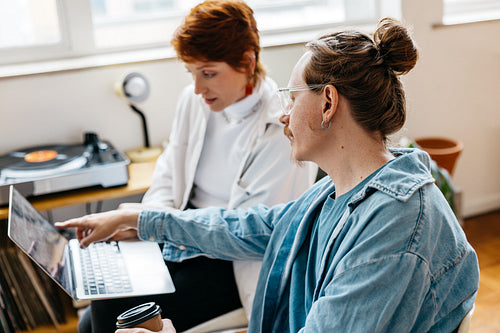 Freelance professionals working together in modern co-working space