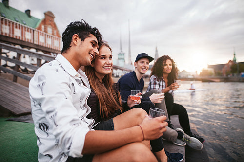 Friends enjoying drinks at vacation