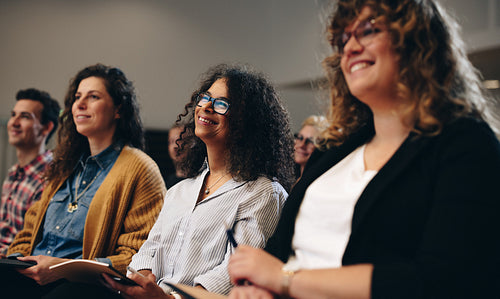People at corporate event in convention center