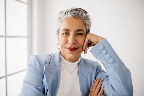 Confident businesswoman in her office: Portrait of empowerment