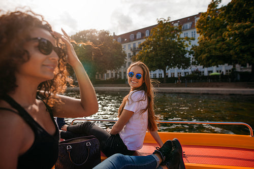 Young women on boat in lake