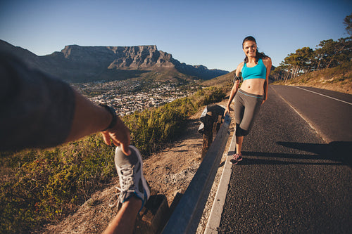 Runners relaxing after morning run