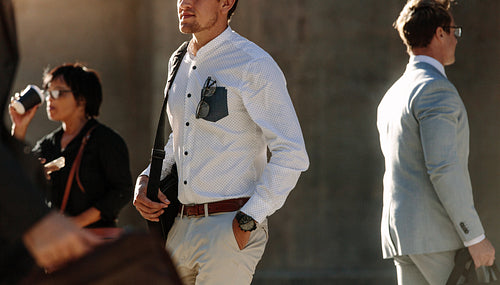 People walking on street going to office in the morning