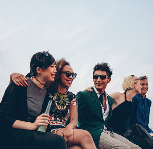 Friends hanging out together on terrace
