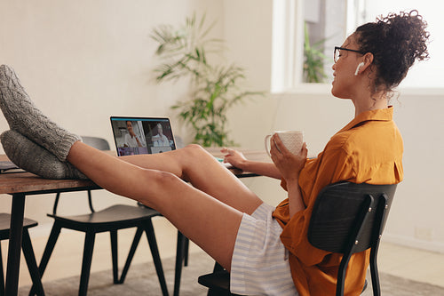Woman having a video call with family
