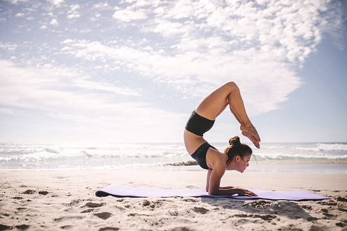 Pincha Mayurasana Scorpion yoga pose