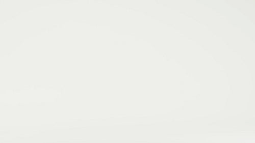 Young woman photographer taking pictures with camera and backpack