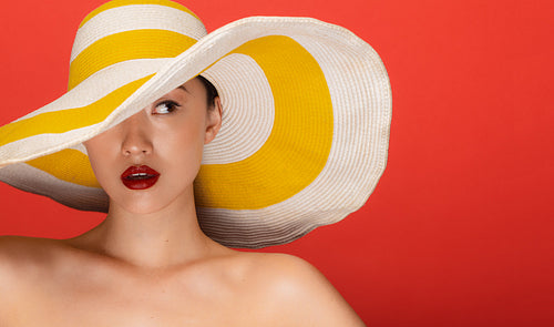 Attractive woman with summer hat