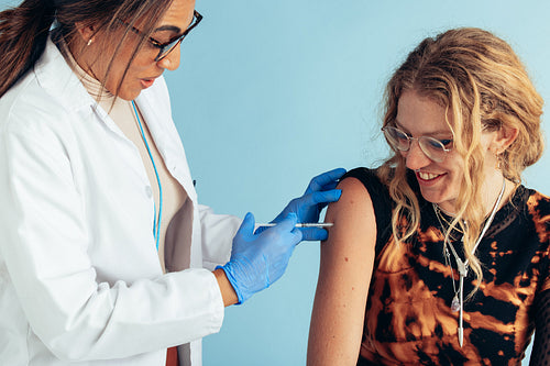 Woman receiving coronavirus vaccine