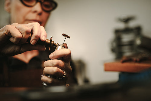 Jeweler preparing the tools for making jewelry