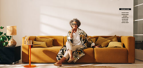 Mature businesswoman sitting in a coworking office