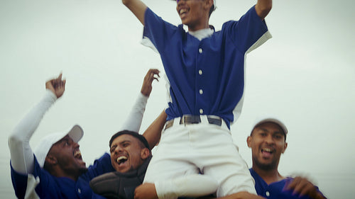 Celebrate triumph with an enthusiastic baseball team