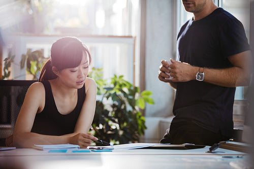 Young people working together on new business project