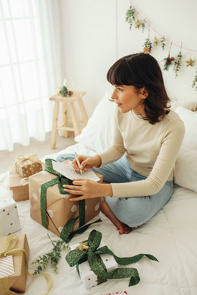Woman writing a christmas letter  