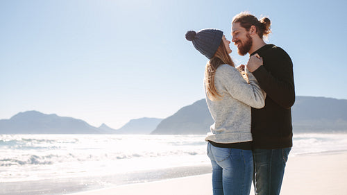 Couple in love spending time together at the beach