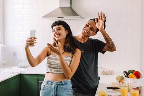 Beautiful young couple making a cooking blog together