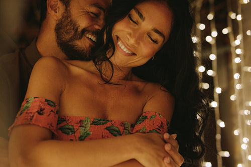 Romantic couple embracing and enjoying an intimate