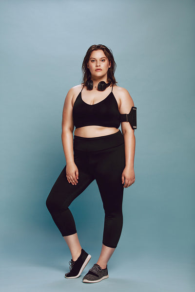 Chubby woman in sports clothing