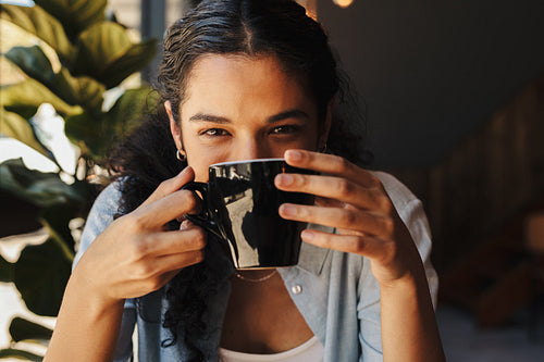 Woman having a cup of coffee