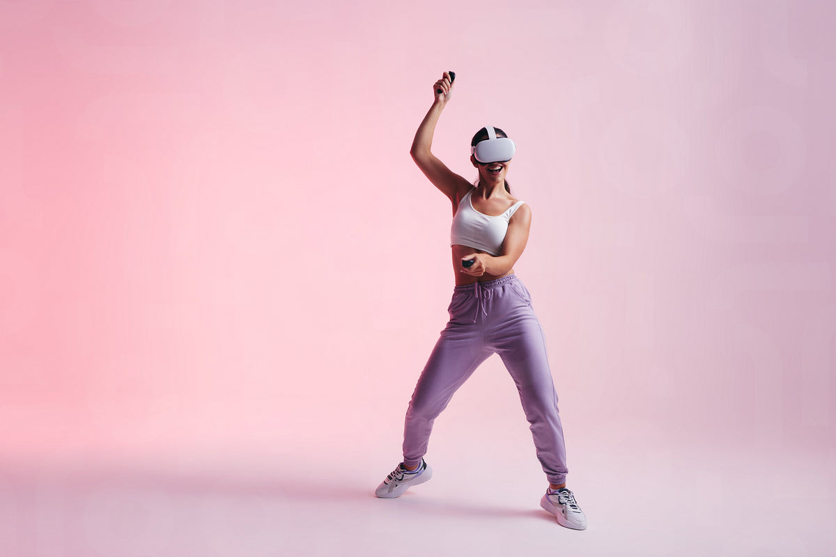 Female gamer dancing and having fun in virtual reality – Jacob Lund ...