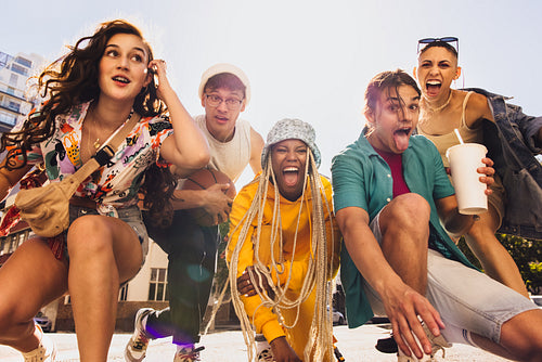 Influencer friends making funny faces outdoors