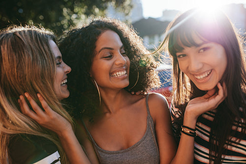 Multiracial female friends enjoying a day around the city