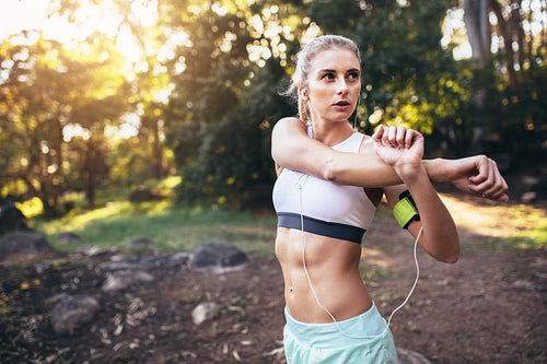 Woman exercising in a park in the morning