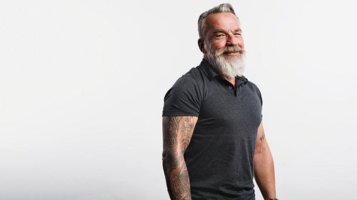 Smiling senior man with a beard