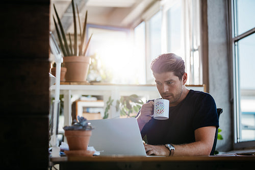 Business man working on laptop in office