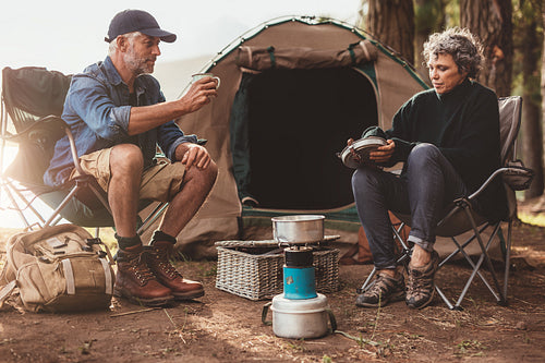Senior couple camping in nature