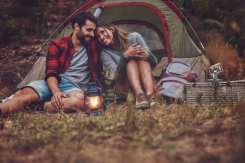 Romantic couple on a camping holiday