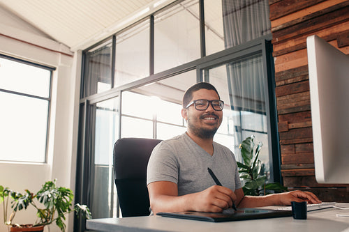 Male graphic designer at work