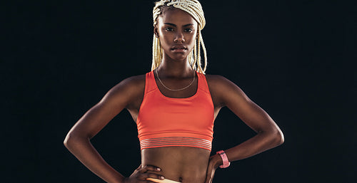 Portrait of a female athlete in fitness clothes