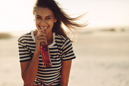 Attractive woman drinking cola