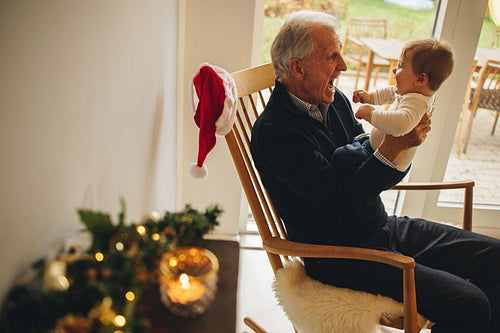 Grandfather playing with his grandson