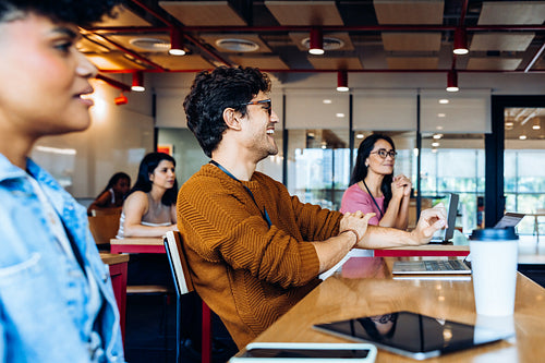 Office learning session with diverse team