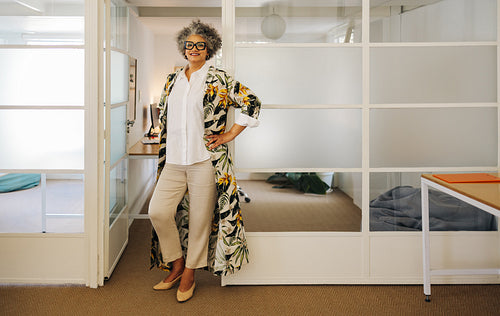 Happy mature businesswoman smiling at the camera