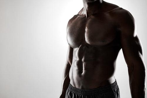 Young african man with muscular body