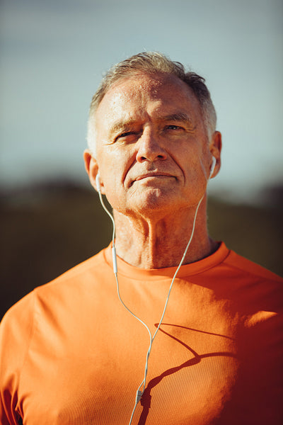 Portrait of a man listening to music