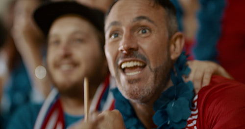 Excited American soccer fans celebrating win