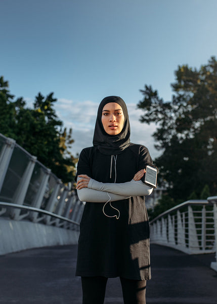 Confident Islamic woman in sportswear