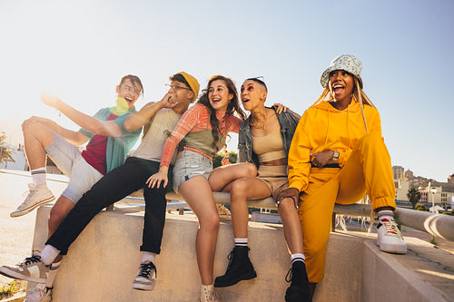 Young people looking away happily