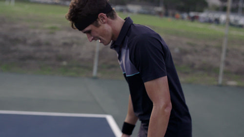 Tennis player celebrating victory