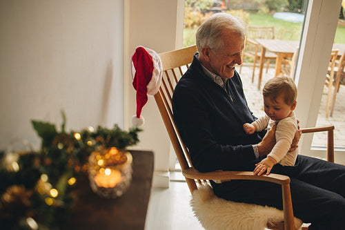 Grandfather and grandson together on christmas