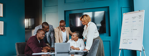 Group of people having a business discussion and working as a team in a boardroom